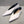 Metal motif slip-on shoes