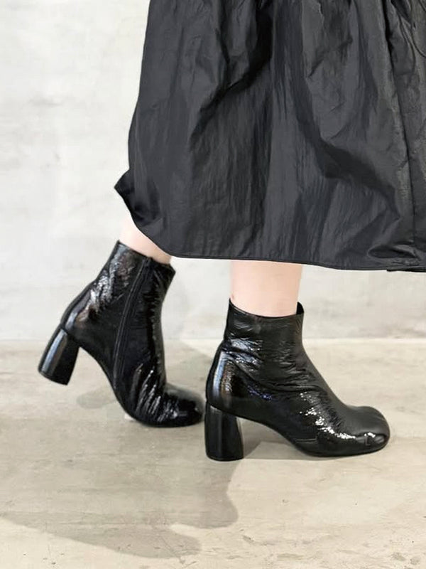 Oblique short boots
