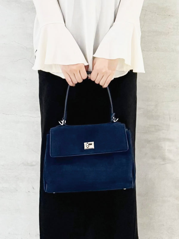 suede twistlock l bag